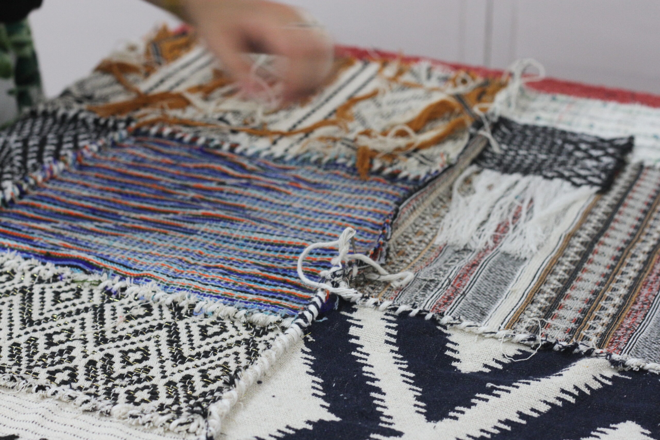 Different pattern textiles stitched together.